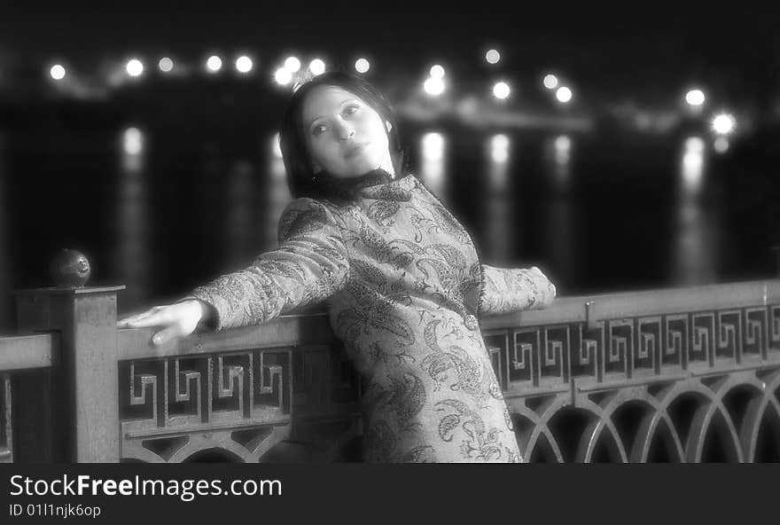 Black and white photo. Portrait of young lonely woman in soft focus. Black and white photo. Portrait of young lonely woman in soft focus.