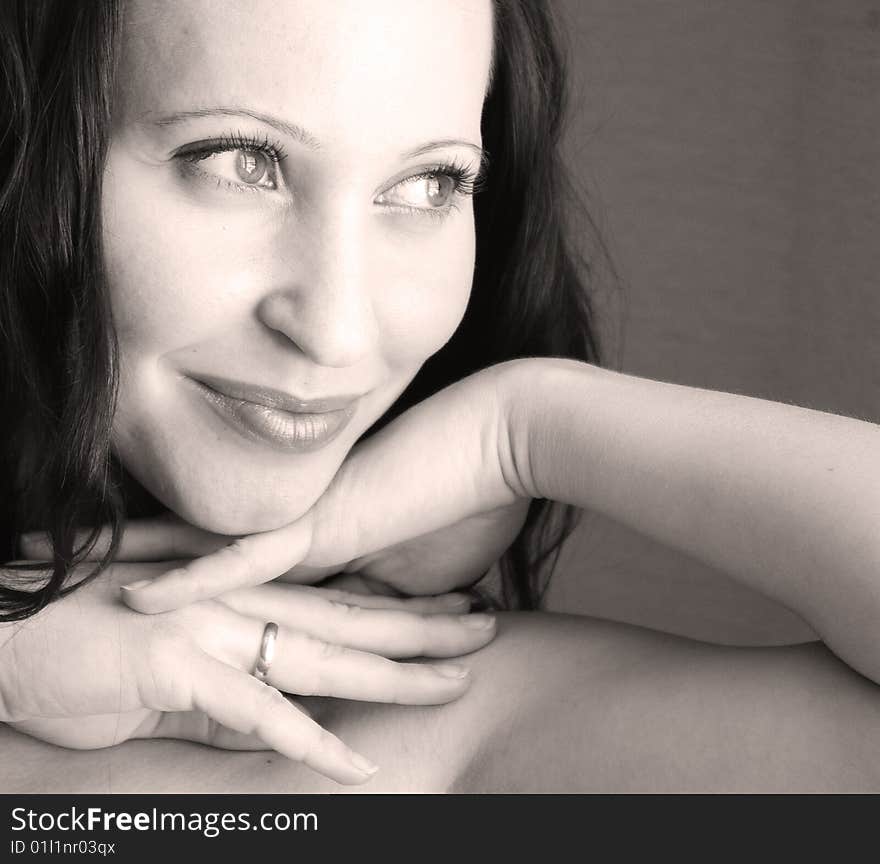 Dark hair young woman black and white portrait. Dark hair young woman black and white portrait