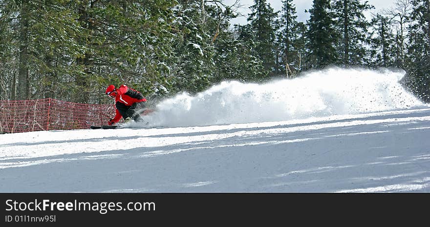 Skier in Clouds of Snow Powder