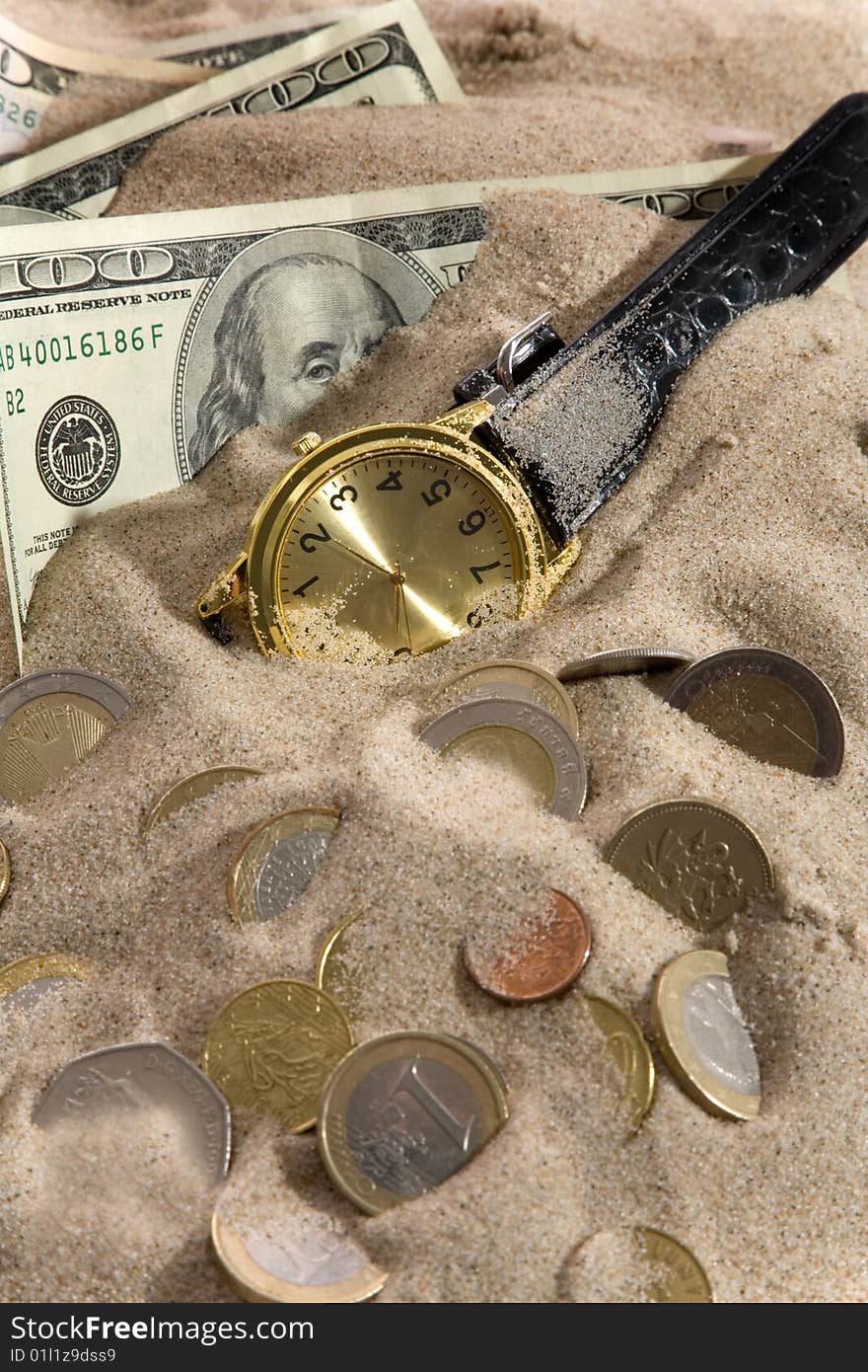 Clock and financial crisis on sand