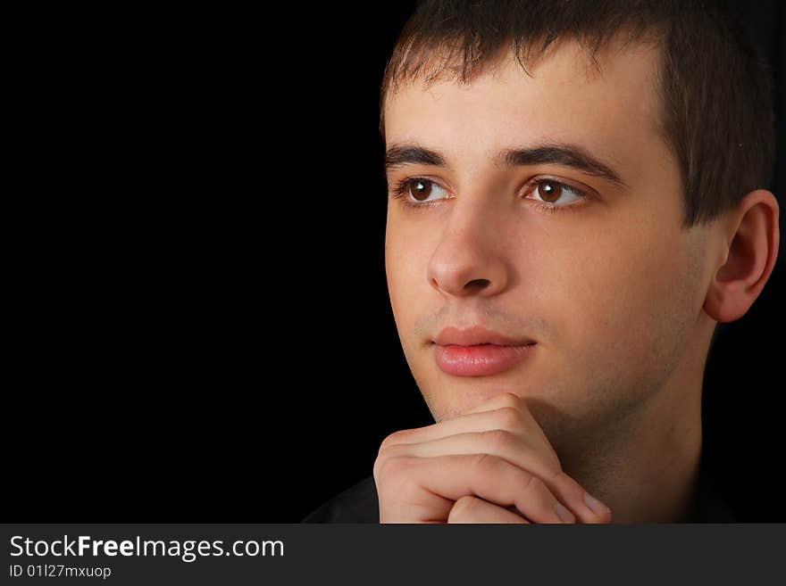 Portrait of serious young man in shirt. Portrait of serious young man in shirt