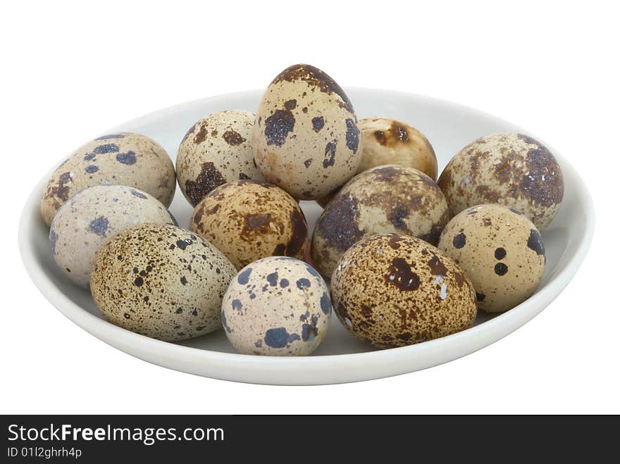 Quail eggs isolated on white background. Selective focus