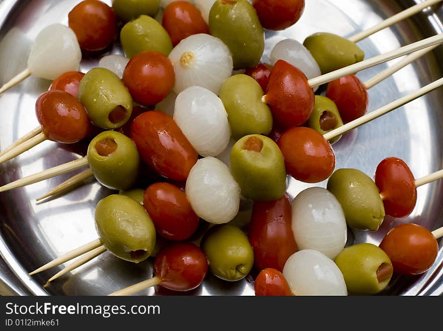 Colorful italian mixed appetizer on a silver tray