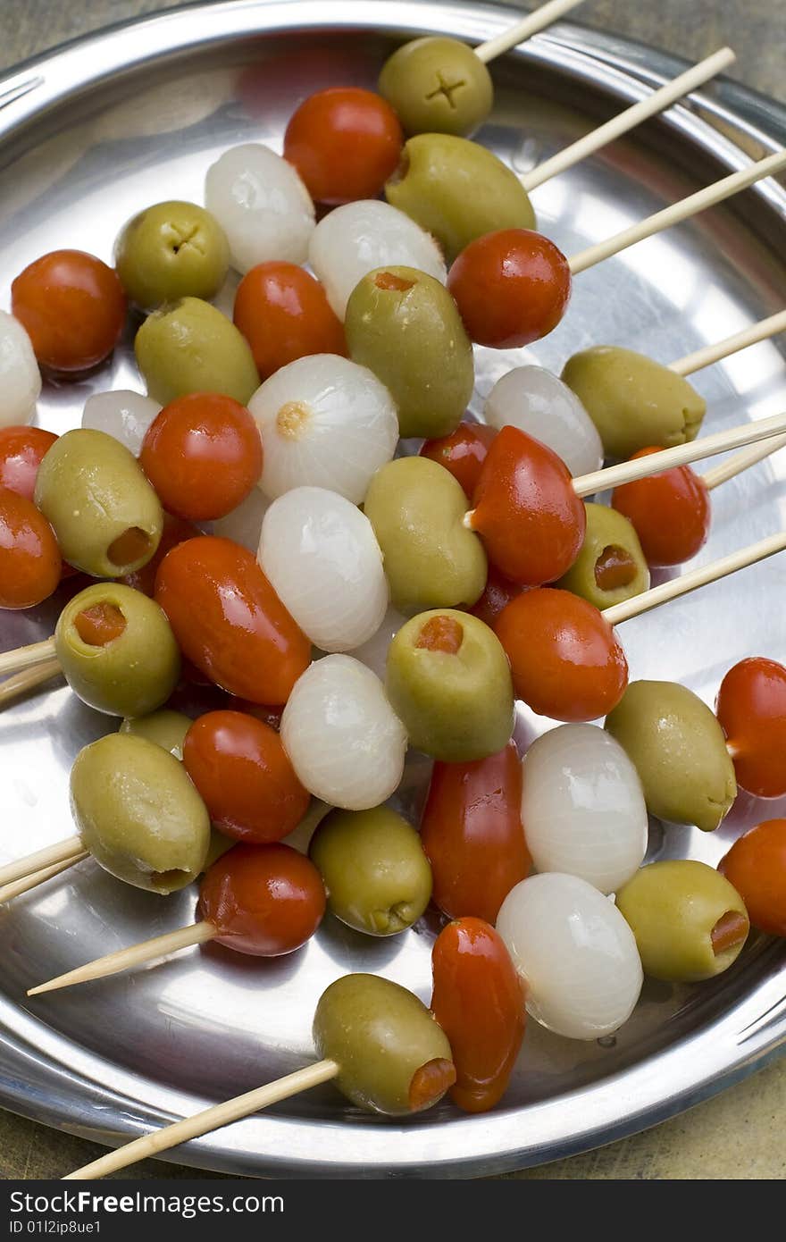 Colorful italian mixed appetizer on a silver tray