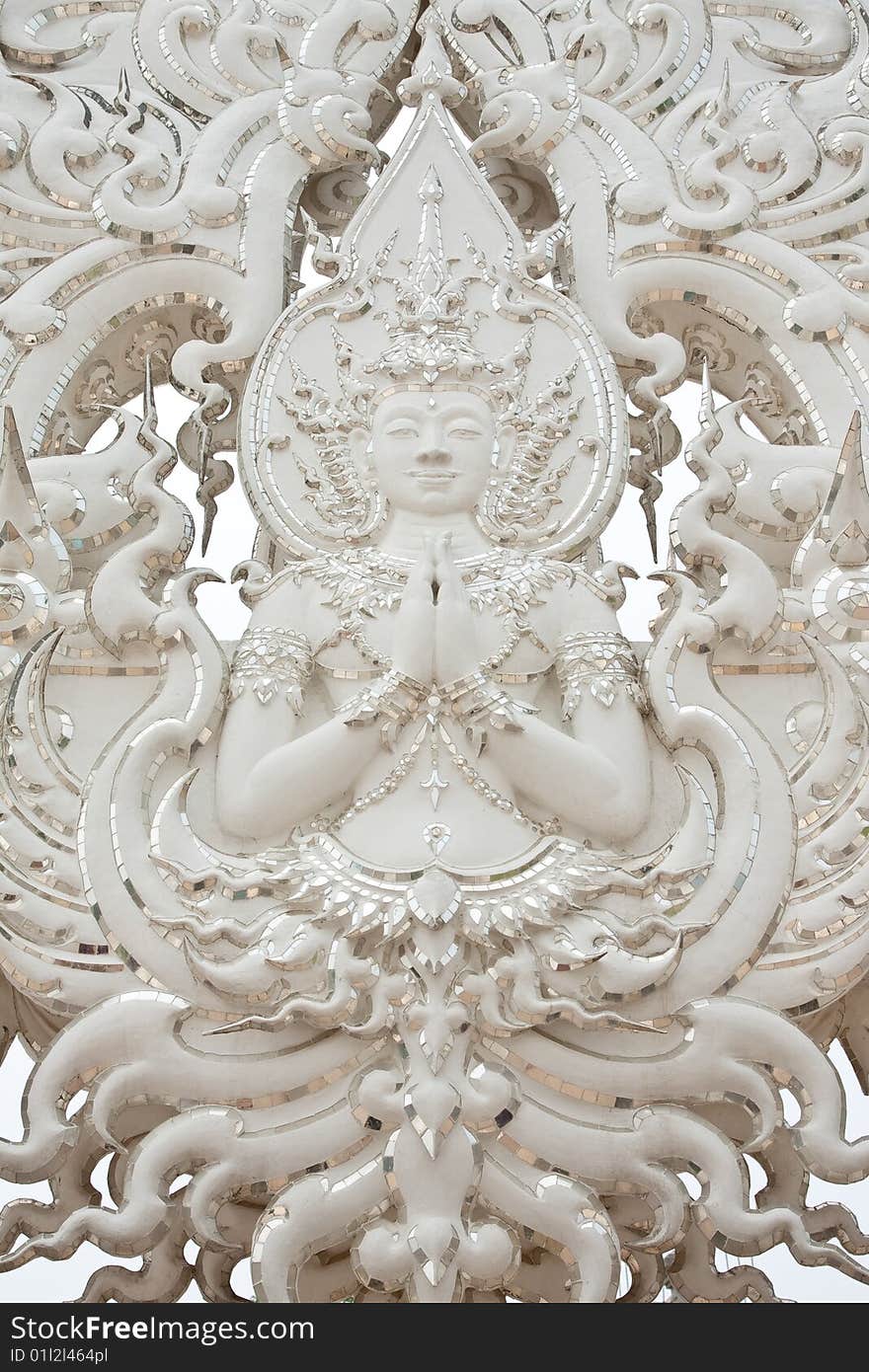 Deva in traditional Thai style art, Wat Rong Khun, Chiang Rai province, Thailand. Deva in traditional Thai style art, Wat Rong Khun, Chiang Rai province, Thailand