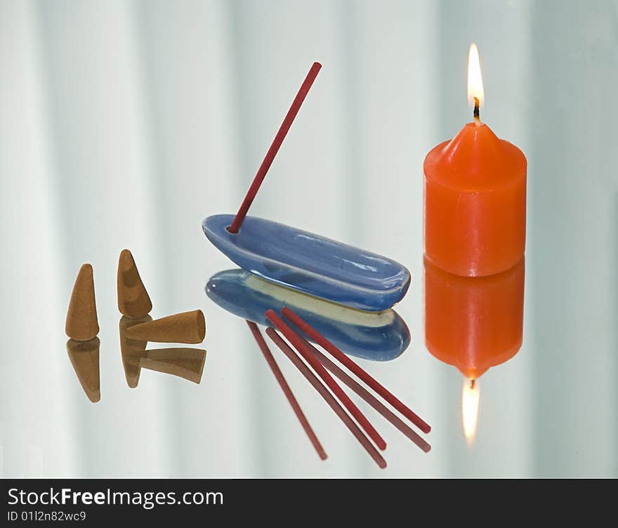 The flavored sticks and candle