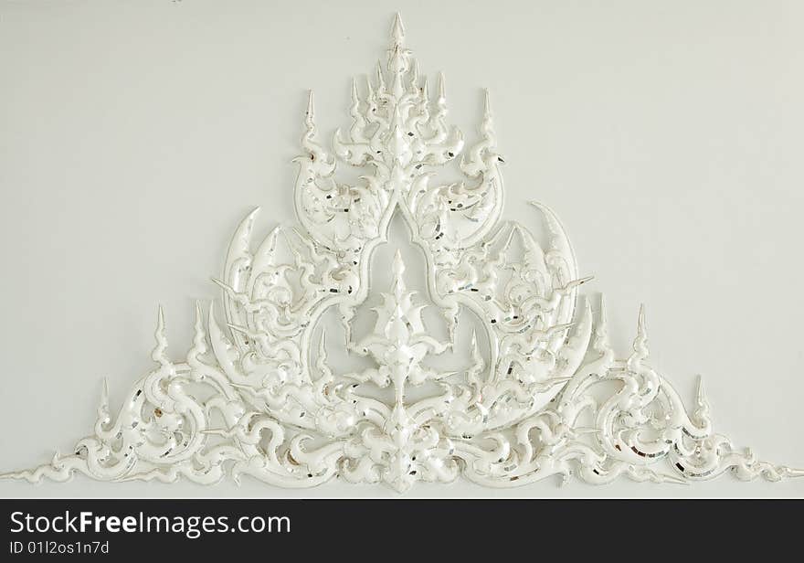 Flower in Thai art, white church of Wat Rong Khun, Chiang Rai province, Thailand