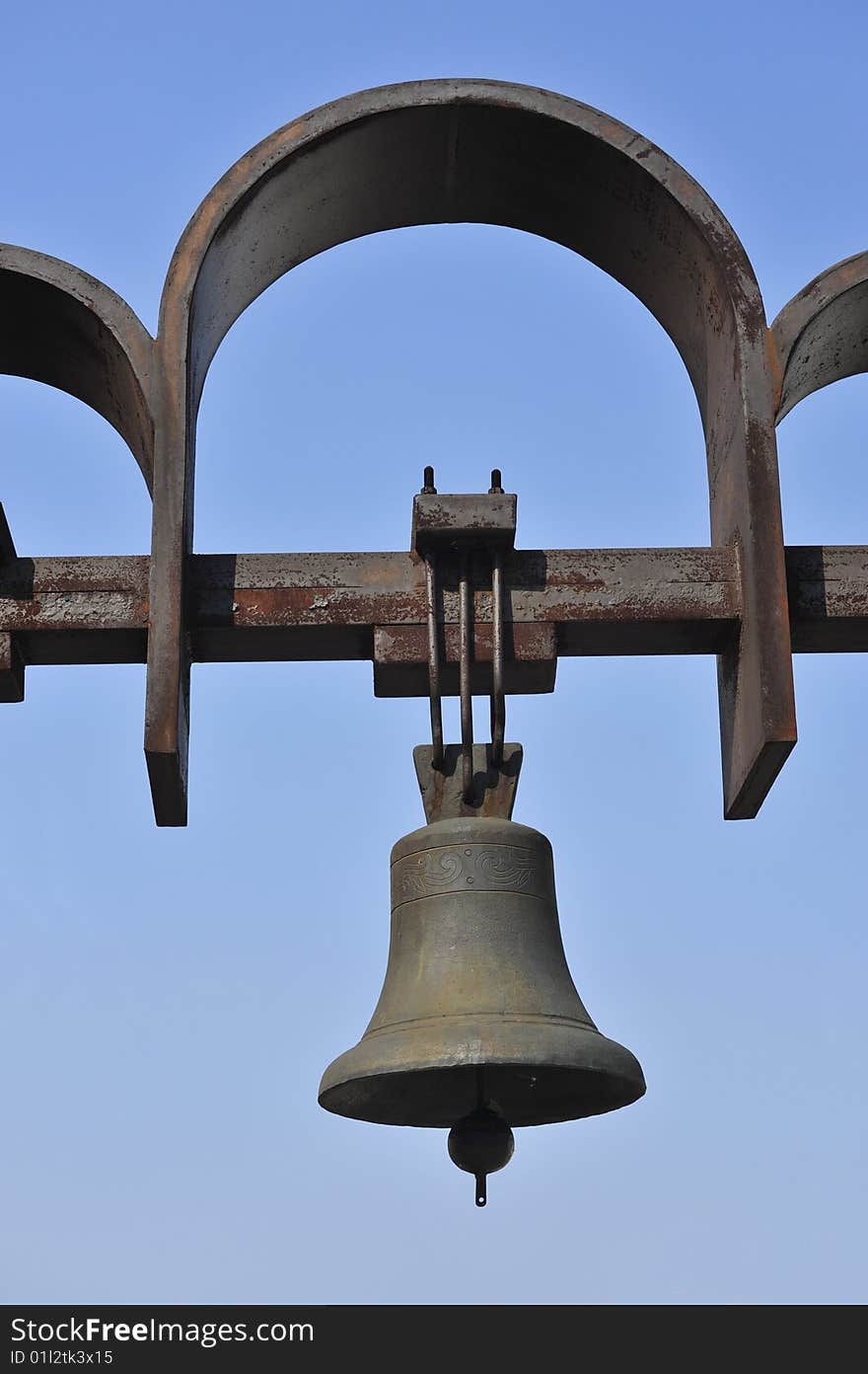 Bell on a metal arch