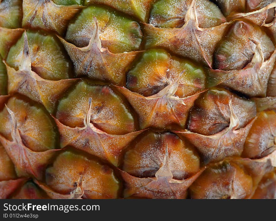 Closeup of nice fresh yellow-brown pineapple texture