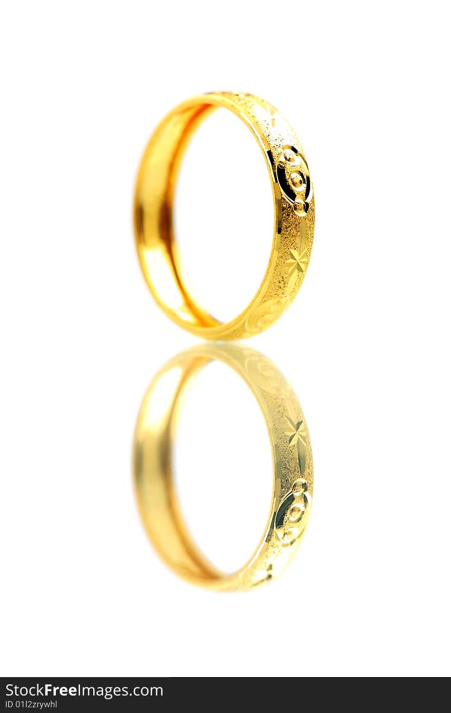 A golden ring standing on white background.