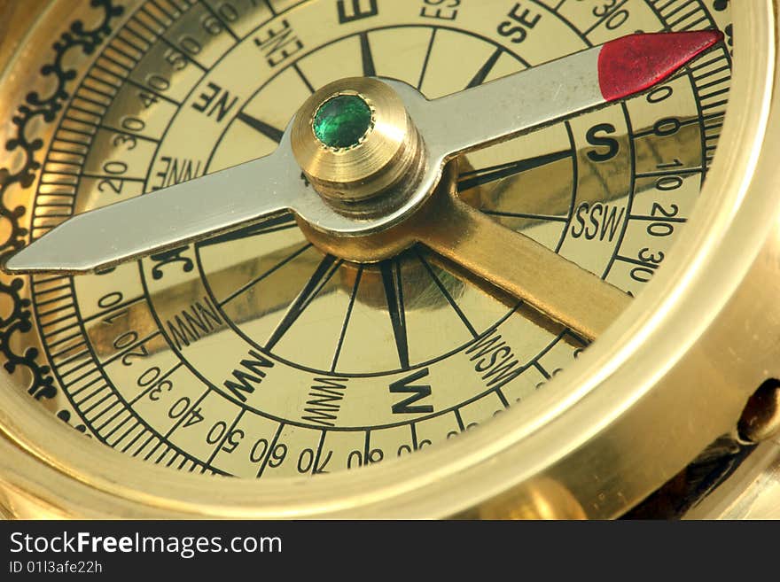 Part of a bronze compass. Part of a bronze compass.