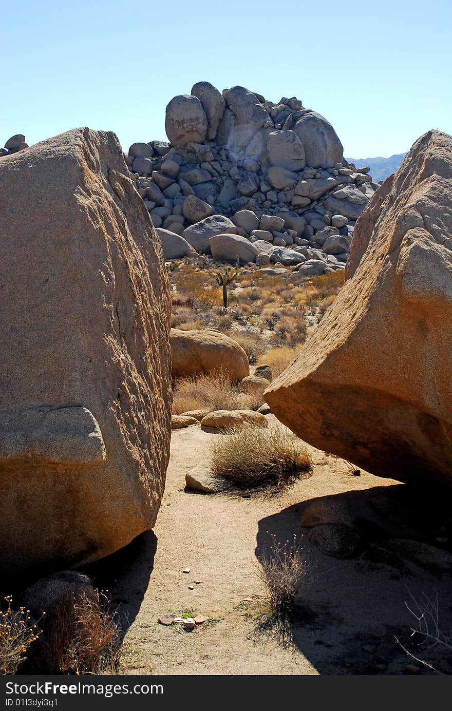 White tank monzanite in Joshua Tree National Park. These rocks are more than a billion years old. White tank monzanite in Joshua Tree National Park. These rocks are more than a billion years old.