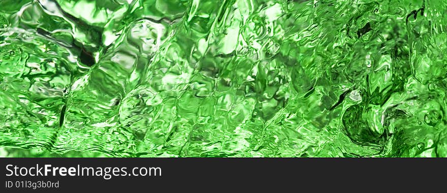 Background with splashing water.green water