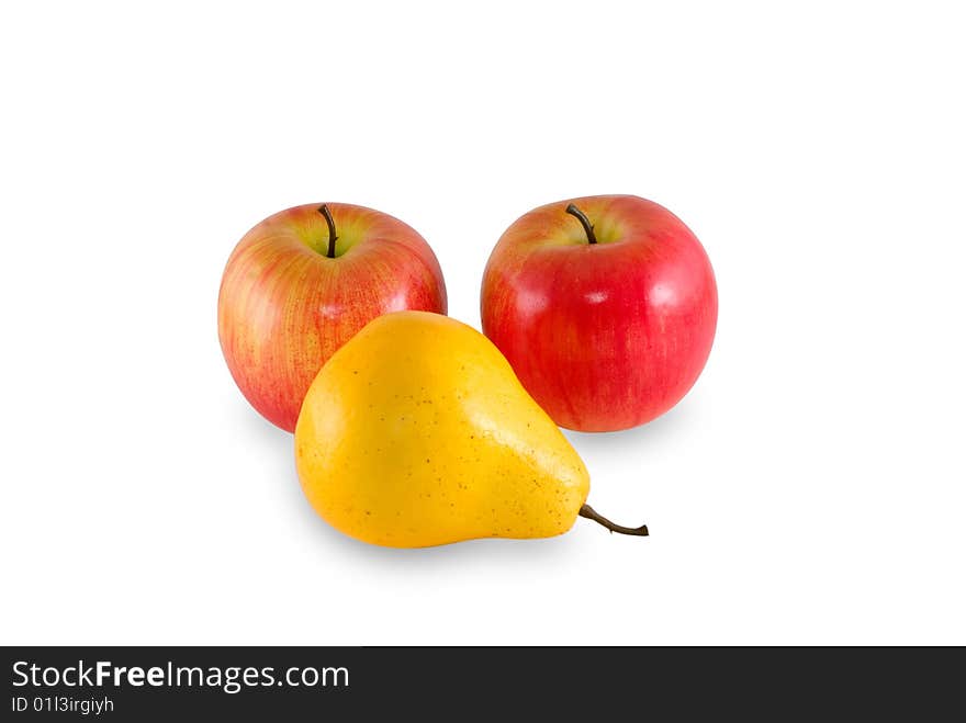 Two apples and pear are photographed on the white background