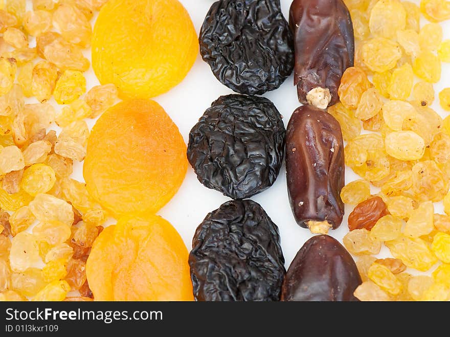 Composition from dried fruits on a light background