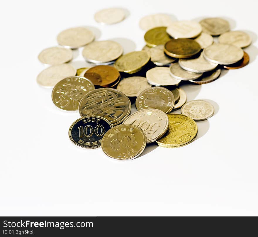 Different coins isolated in white. Different coins isolated in white