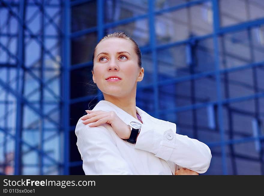 Business women in white on business architecture background