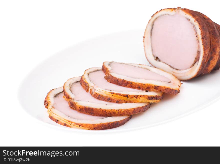 Delicious baked ham with bacon isolated over white. Bon appetit!. Delicious baked ham with bacon isolated over white. Bon appetit!