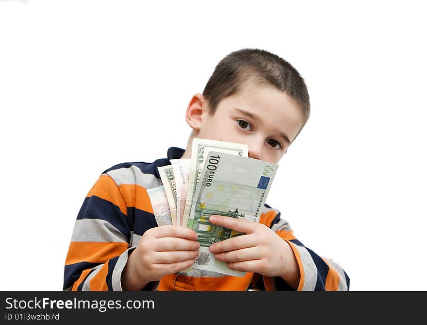 Cute little boy holds banknotes