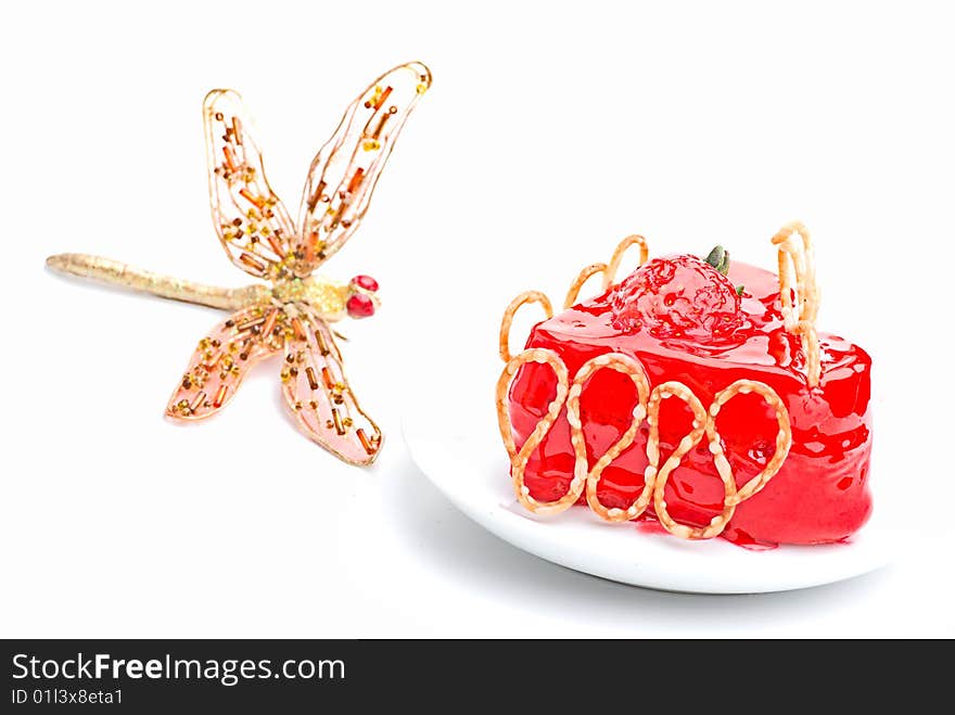 Cake with strawberry topping on a plate