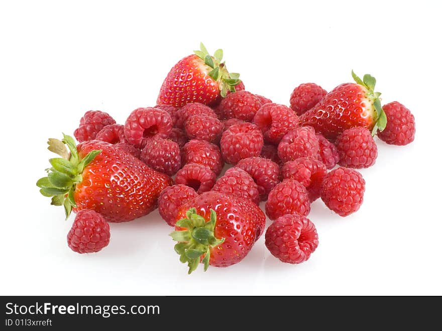 Bunch of strawberries and raspberries isolated on white. Bunch of strawberries and raspberries isolated on white.