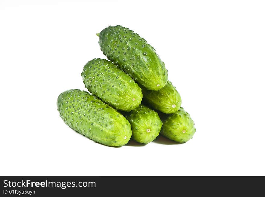 Green cucumber vegetable fruits isolated on white background