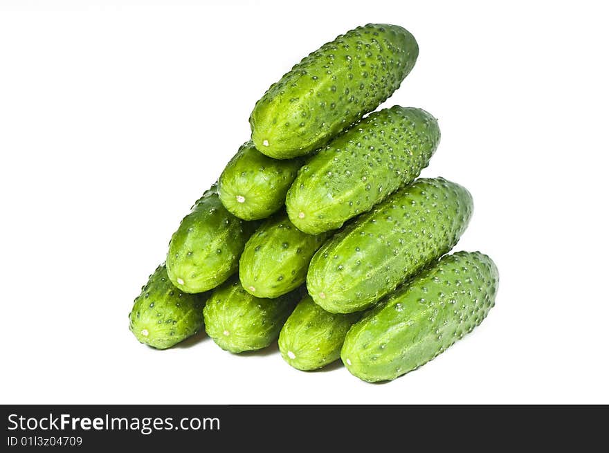 Green cucumber vegetable fruits isolated on white background