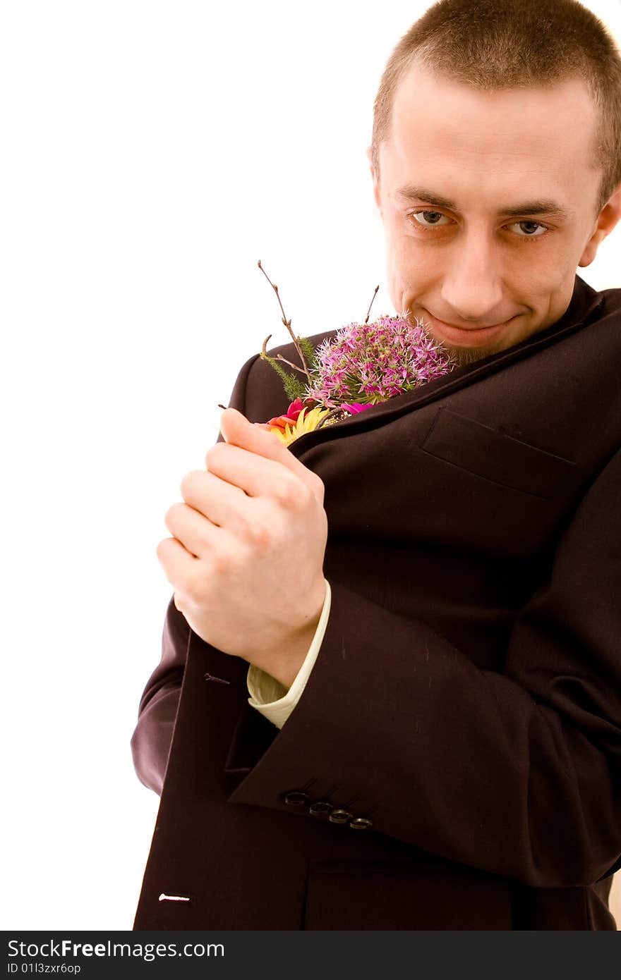 Man with flowers on white background