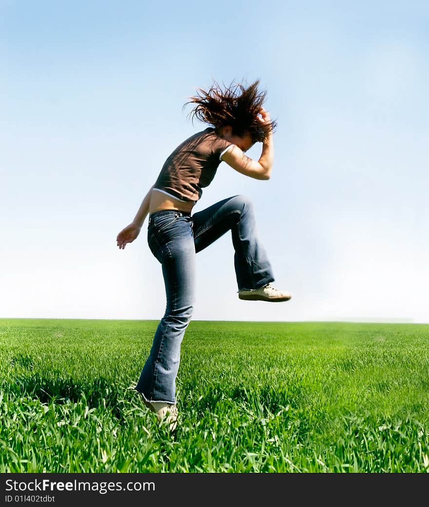 Jumping girl on natural background