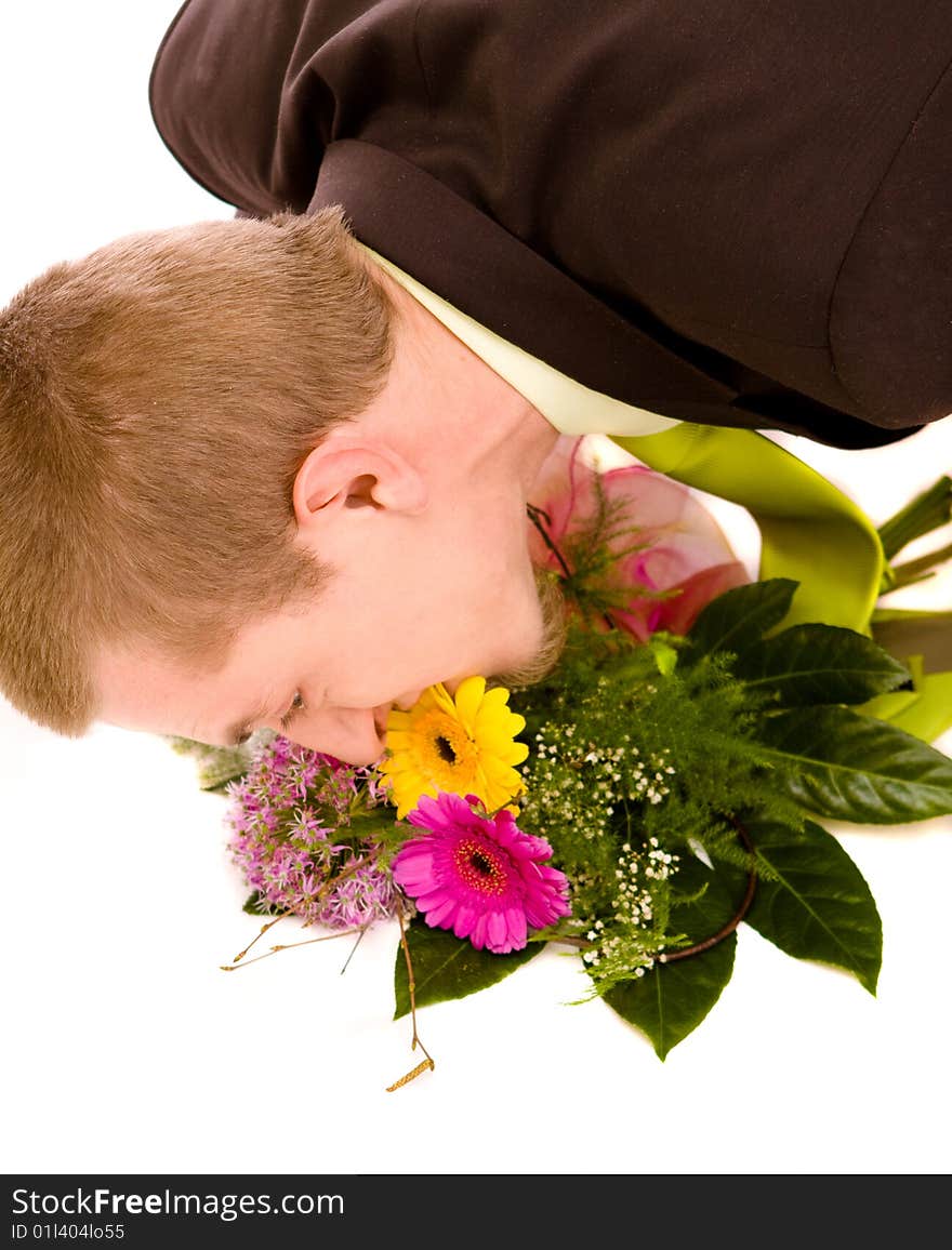 Man with flowers on white background. Man with flowers on white background