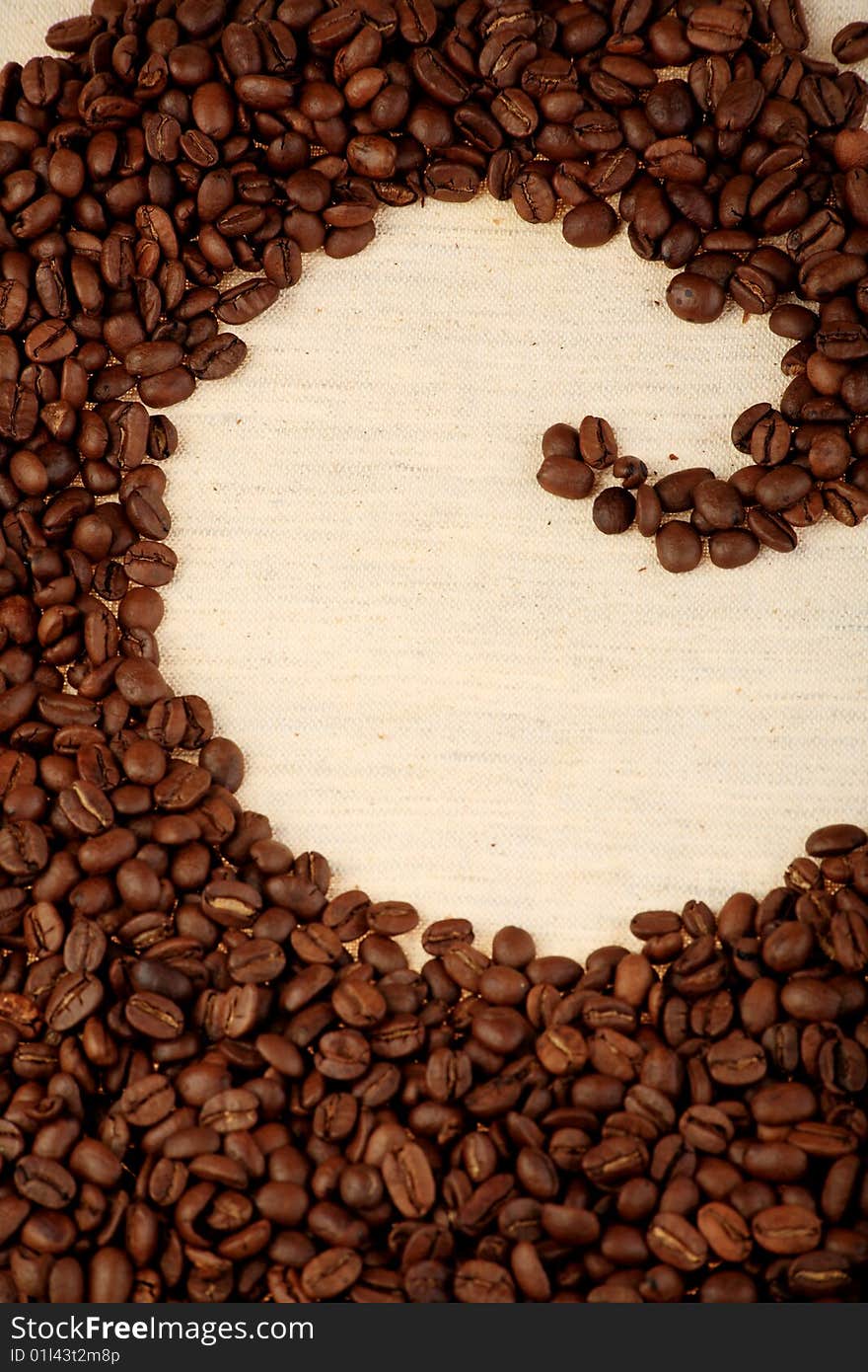 Coffee background: Close-up of a beans cup, mill. Coffee background: Close-up of a beans cup, mill