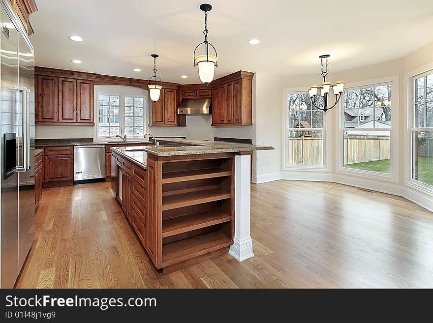 Kitchen in new construction home with eating area