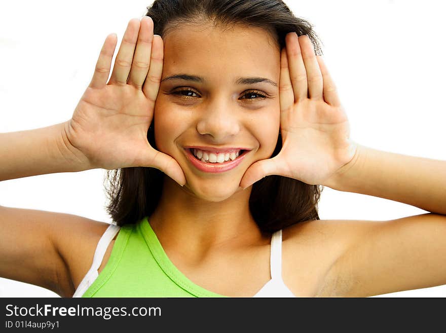 Adorable african american teenage girl framing her face with palms - isolated on white background. Adorable african american teenage girl framing her face with palms - isolated on white background.