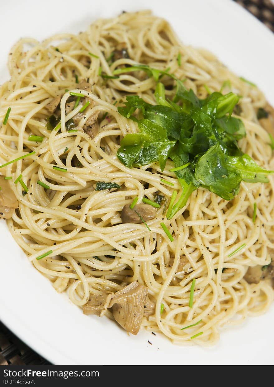 Fresh pasta on a white plate. Fresh pasta on a white plate