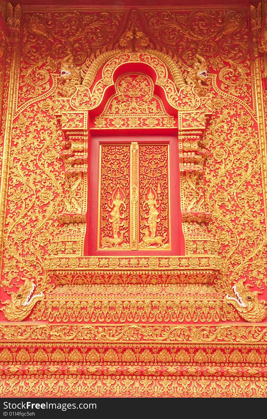 Traditional Thai art church door, Chiang Rai province, Thailand