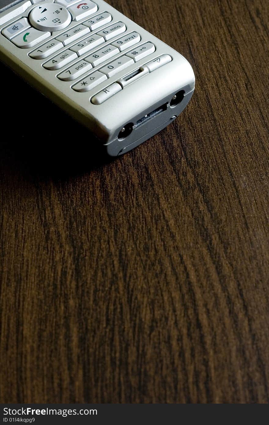 Telephone on wooden brown board. Telephone on wooden brown board