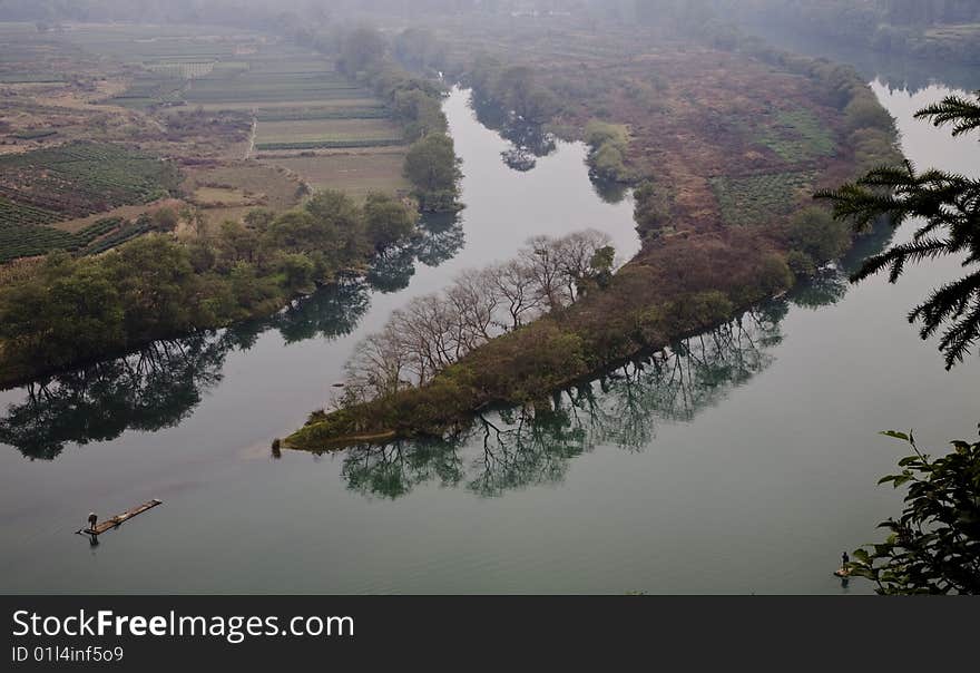 River by a village in the south of china. River by a village in the south of china