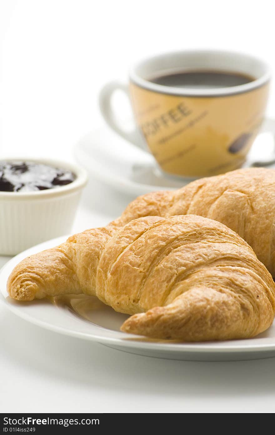 Continental Breakfast Of Coffee And Croissants