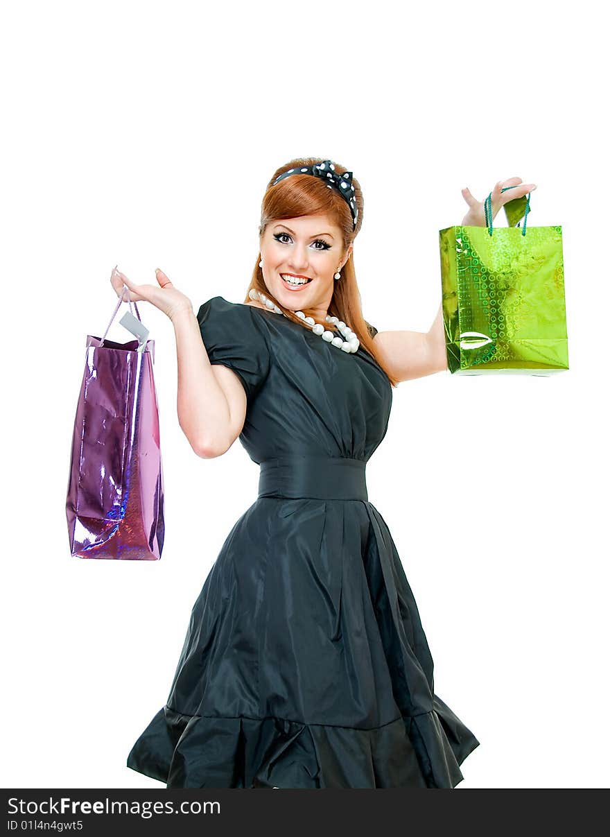 Young woman shows her gift in color packets. Young woman shows her gift in color packets