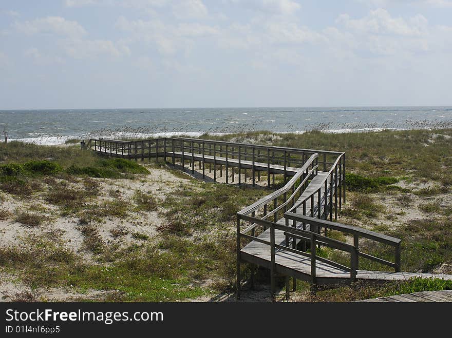 Atlantic Ocean with dunes and walkway. Atlantic Ocean with dunes and walkway