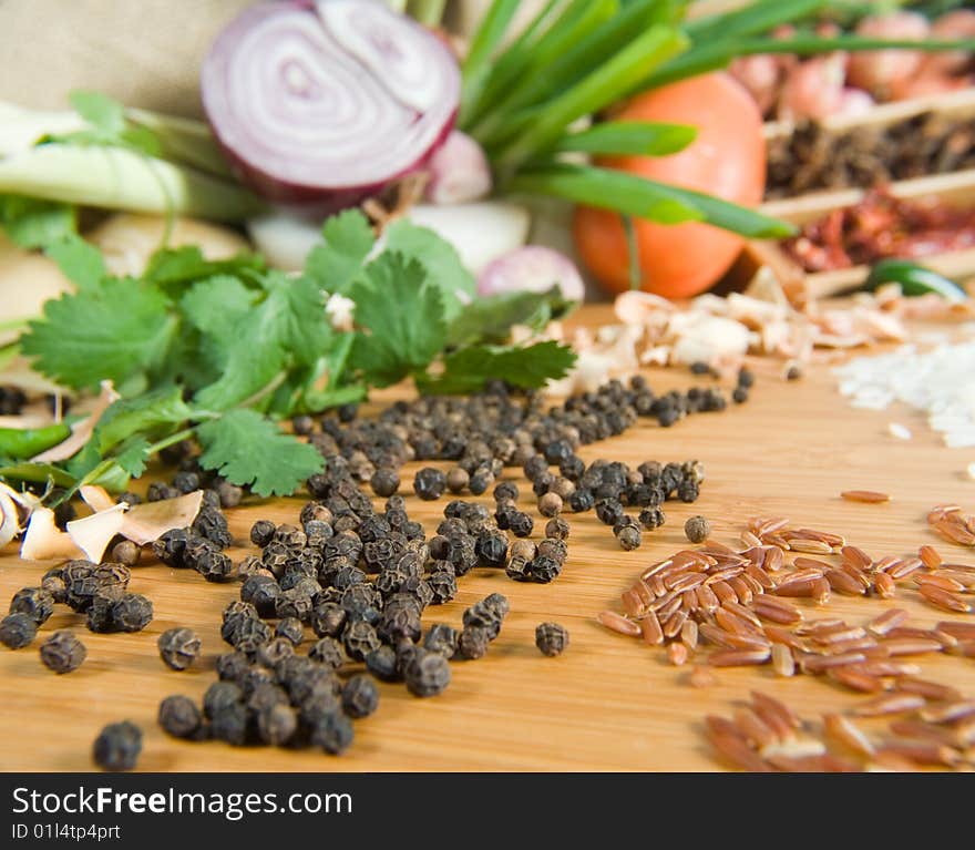 Fresh grains and spices with vegetables