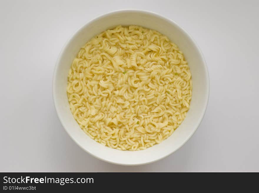 Fast noodles on a white plate