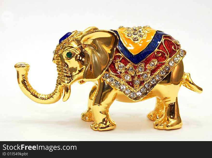 Figurine of golden coloured small elephant