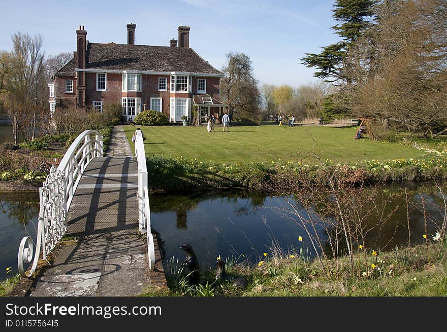 Newtimber Place is a Sussex moated house, built of flint and brick with a roof of Horsham stone. The original house was probably built by Richard Bellingham's son, who was Sheriff of Sussex in 1567.