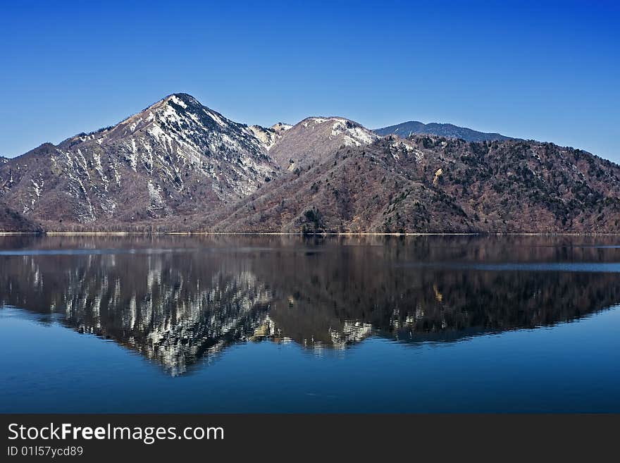 I took this one at Japanese world heritage which named nikko. The lake is so clear and the water is able to drink. You can see the mountain's  reflection clearly. The blue sky and the lake make the perfect combination. I took this one at Japanese world heritage which named nikko. The lake is so clear and the water is able to drink. You can see the mountain's  reflection clearly. The blue sky and the lake make the perfect combination.