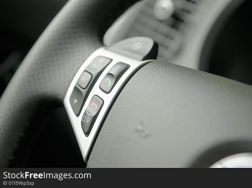 Buttons of inclusion and phone deenergizing on a steering wheel. Buttons of inclusion and phone deenergizing on a steering wheel.