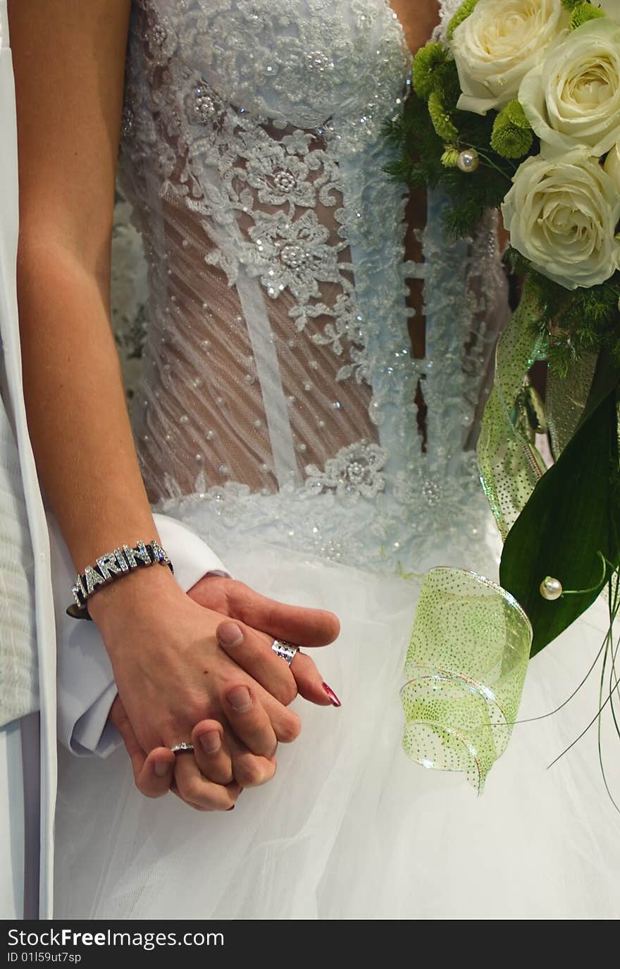 Just married - holding hands close up