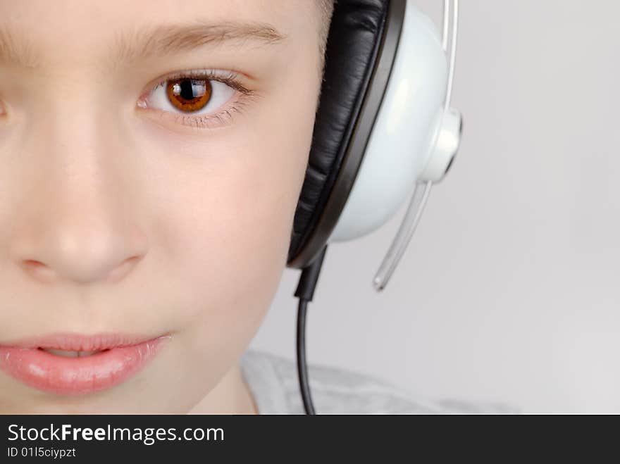 Boy in headphones with copy space. Boy in headphones with copy space