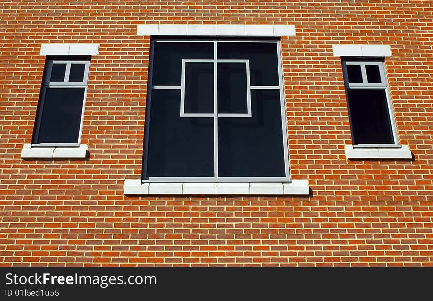 Three window and simple brick wall architecture. Three window and simple brick wall architecture