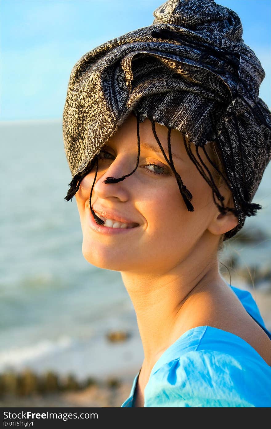 A young girl in the headdress. A young girl in the headdress